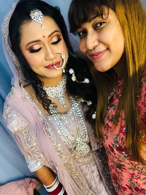 Manisha with a bride in lilac