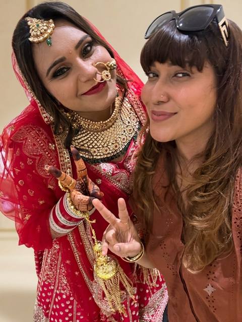 Manisha with a smiling bride