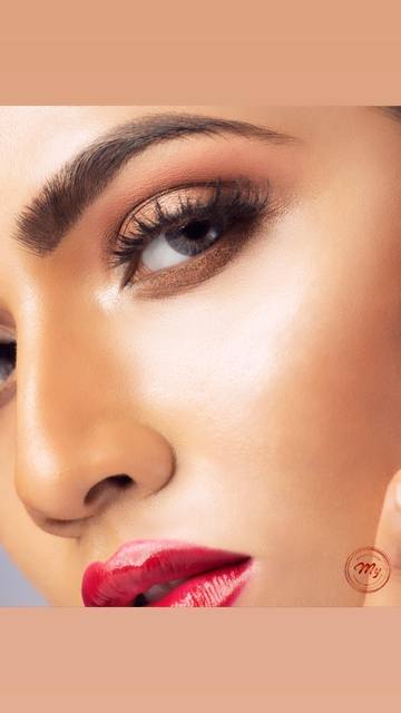 Close beauty shot of bronze eye and flawless skin