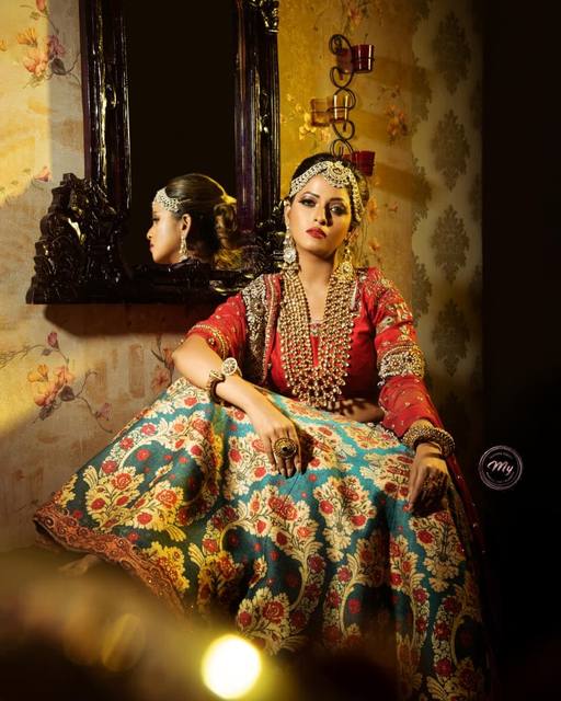Heritage editorial with mirror and candlelight