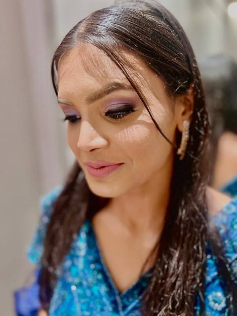 Violet smoky eye with sleek hair